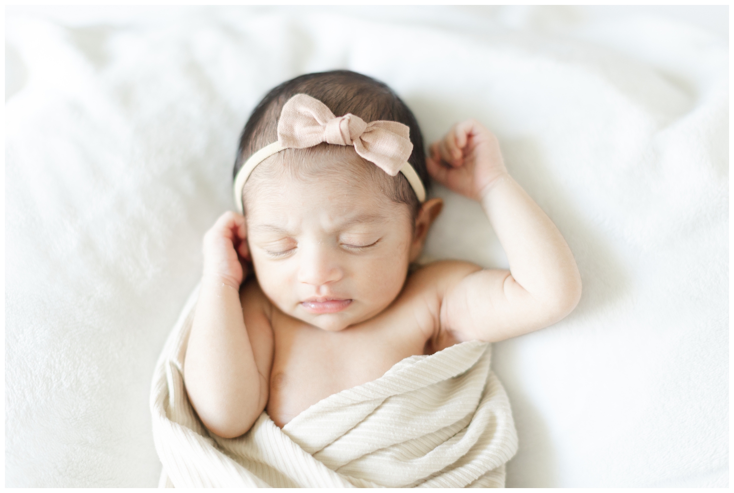 Newborn baby girl sleeping for newborn photos in NJ.