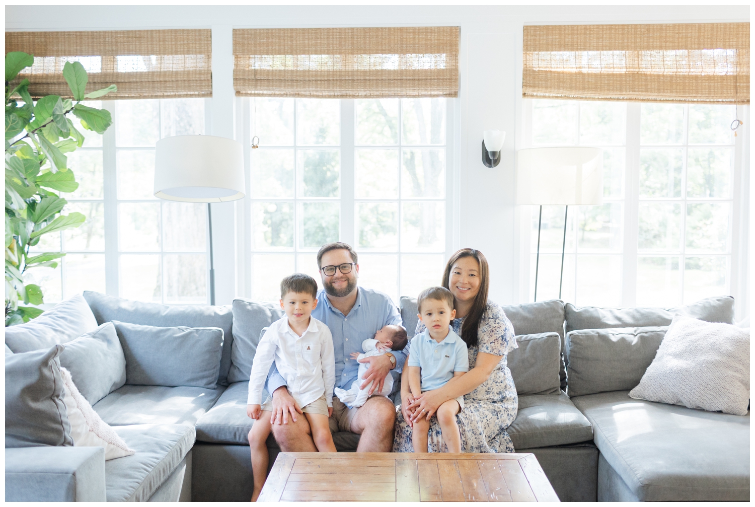 Family photo with toddler and newborn in a bright in-home session in Basking Ridge NJ.