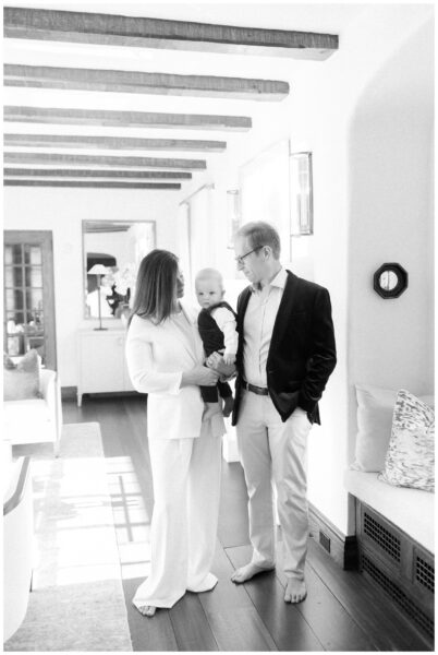 Mom and dad looking at their baby boy at their home in Summit NJ.